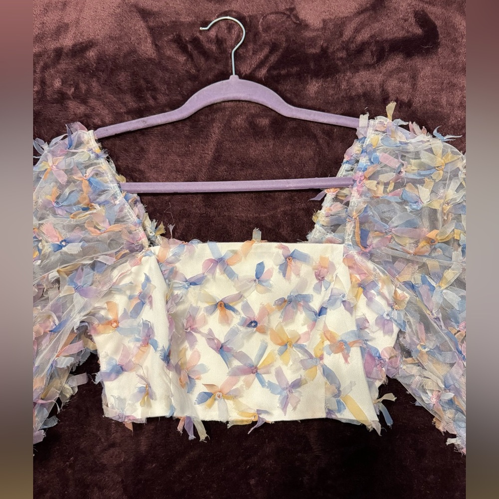 Flower embellished crop top